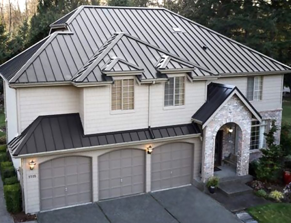roof-repair-home-value a three door garage home with metal roofs